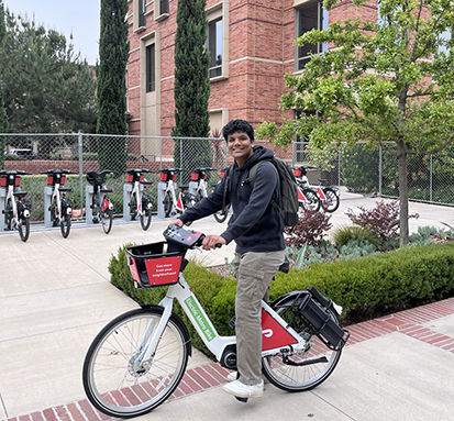 Undergraduate student Gaurav Agarwal on a Metro Bike