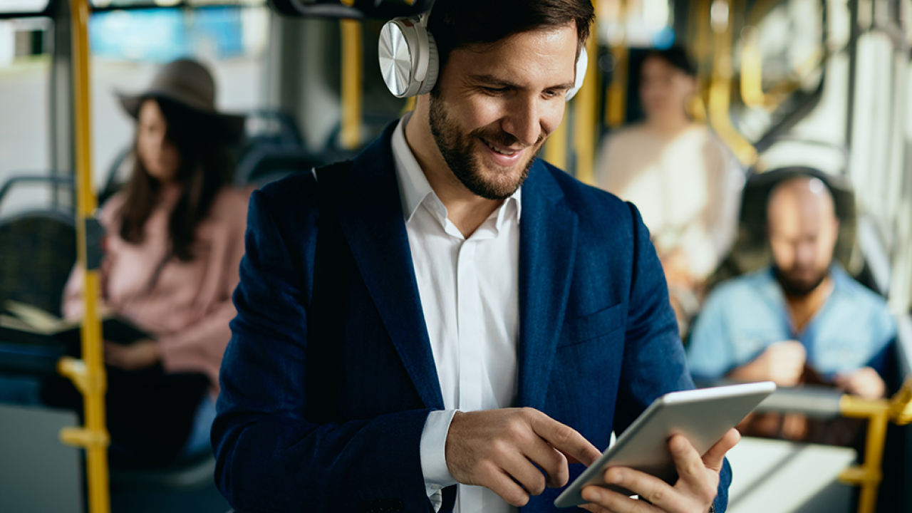 Bus Passenger with Tablet