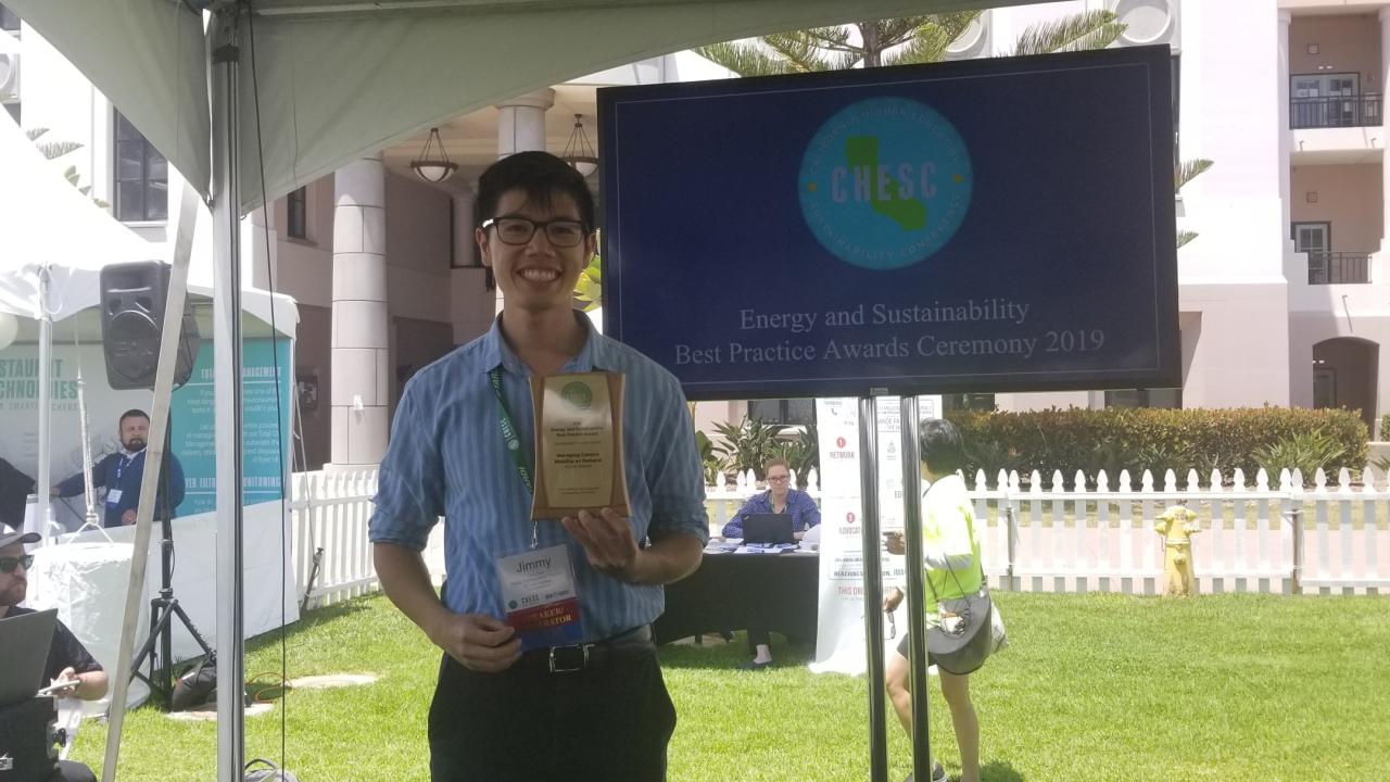 Jimmy Tran receives award on behalf of UCLA Transportation at CHESC Conference in Santa Barbara