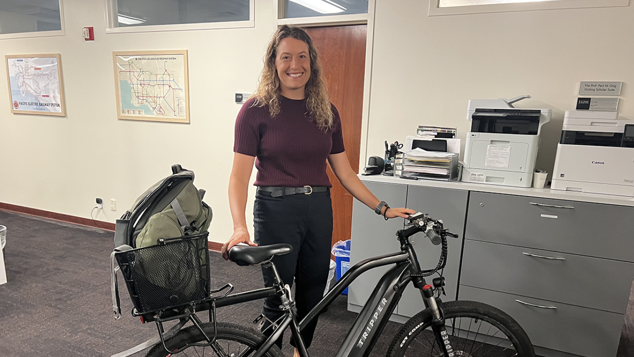 Ellen at her campus office with her bike