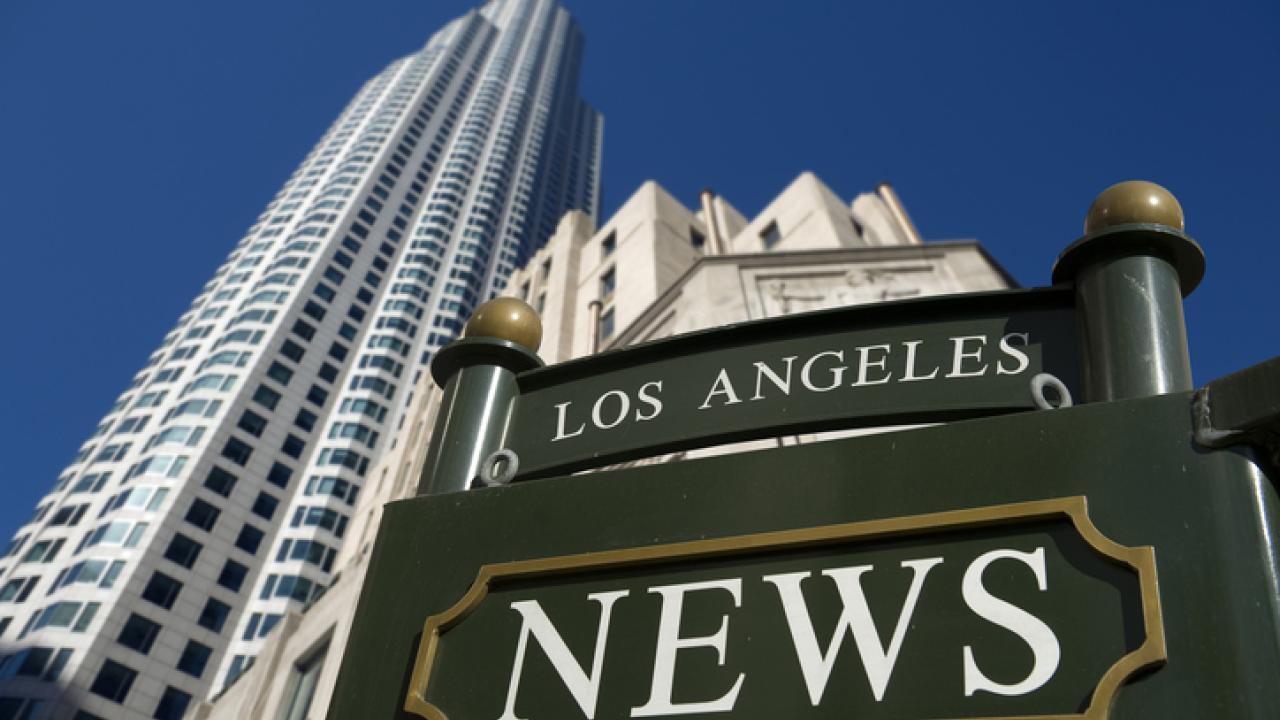Los Angeles News sign and skyscraper