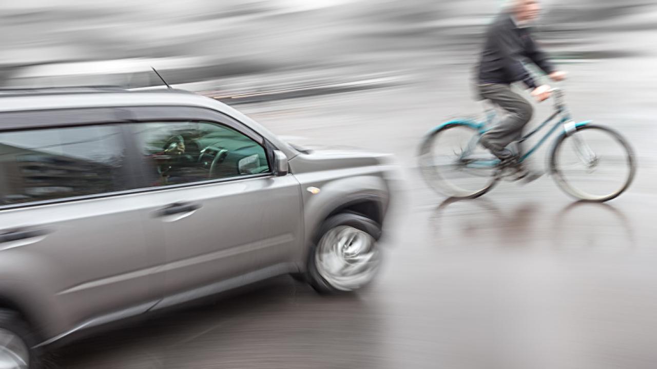 Vehicle Striking Cyclist Turning Right