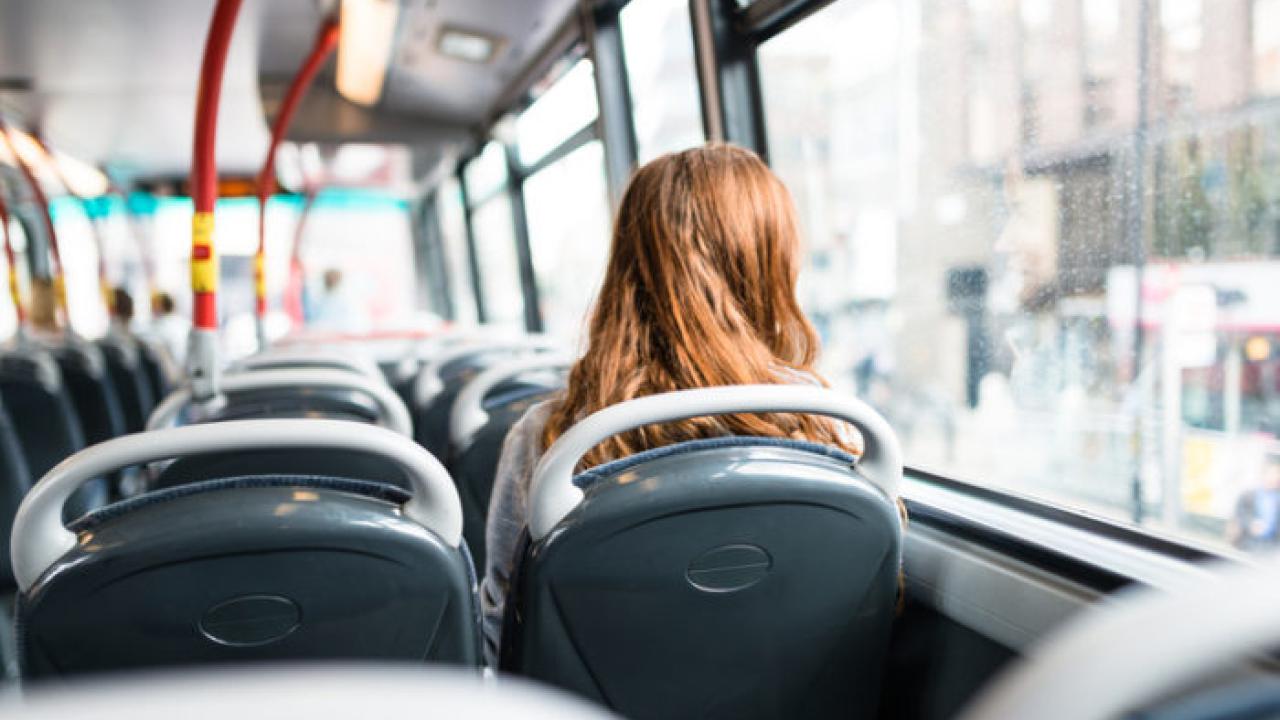 Woman riding a bus