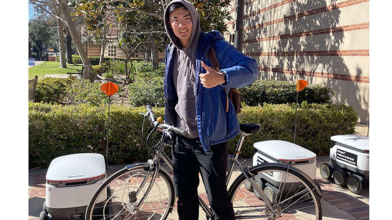 Commuter student with his bike 