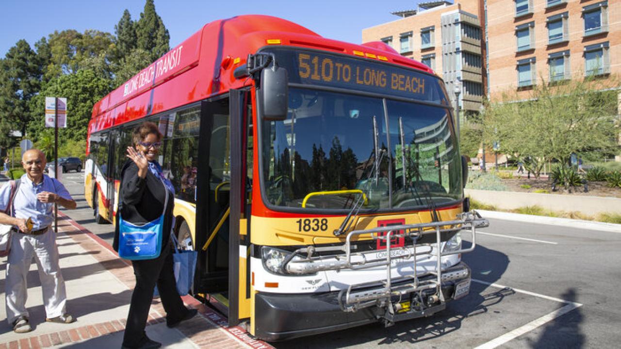 UCLA Health Employee Althea Nelson boards the Long Beach Transit bus
