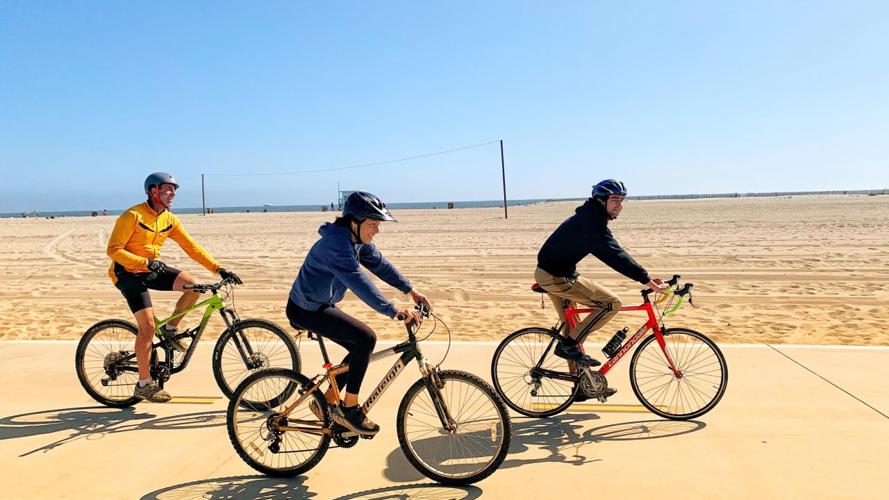 Bike riders at the beach
