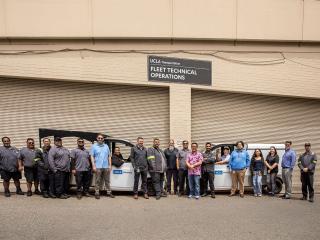 Group photo in the yard of the Fleet team