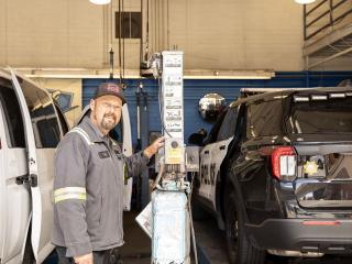 Mechanic Riley at the fleet yard.