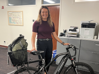 Ellen at her campus office with her bike