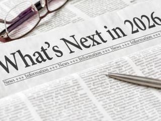 News paper with headline What's Next in 2026