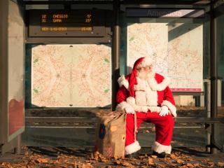 Santa Waiting at a Transit Stop