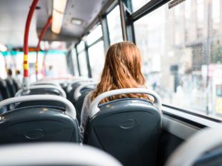 Woman riding a bus