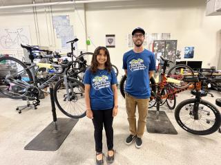 Active transportation planner Sana and Martin, supervisor of the Bike Shop, happily supporting UCLA Bike Month tee shirts.