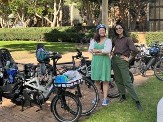 Two happy e-bike riders in north campus at UCLA