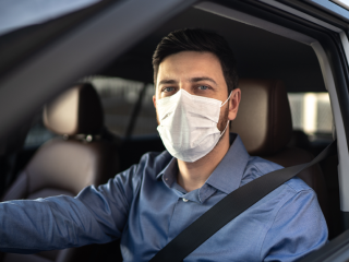 Driver wearing face mask