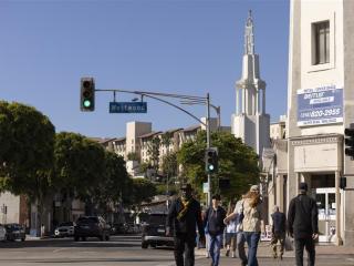 Pedestrians walk along westwood boulevard