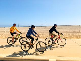 Bike riders at the beach